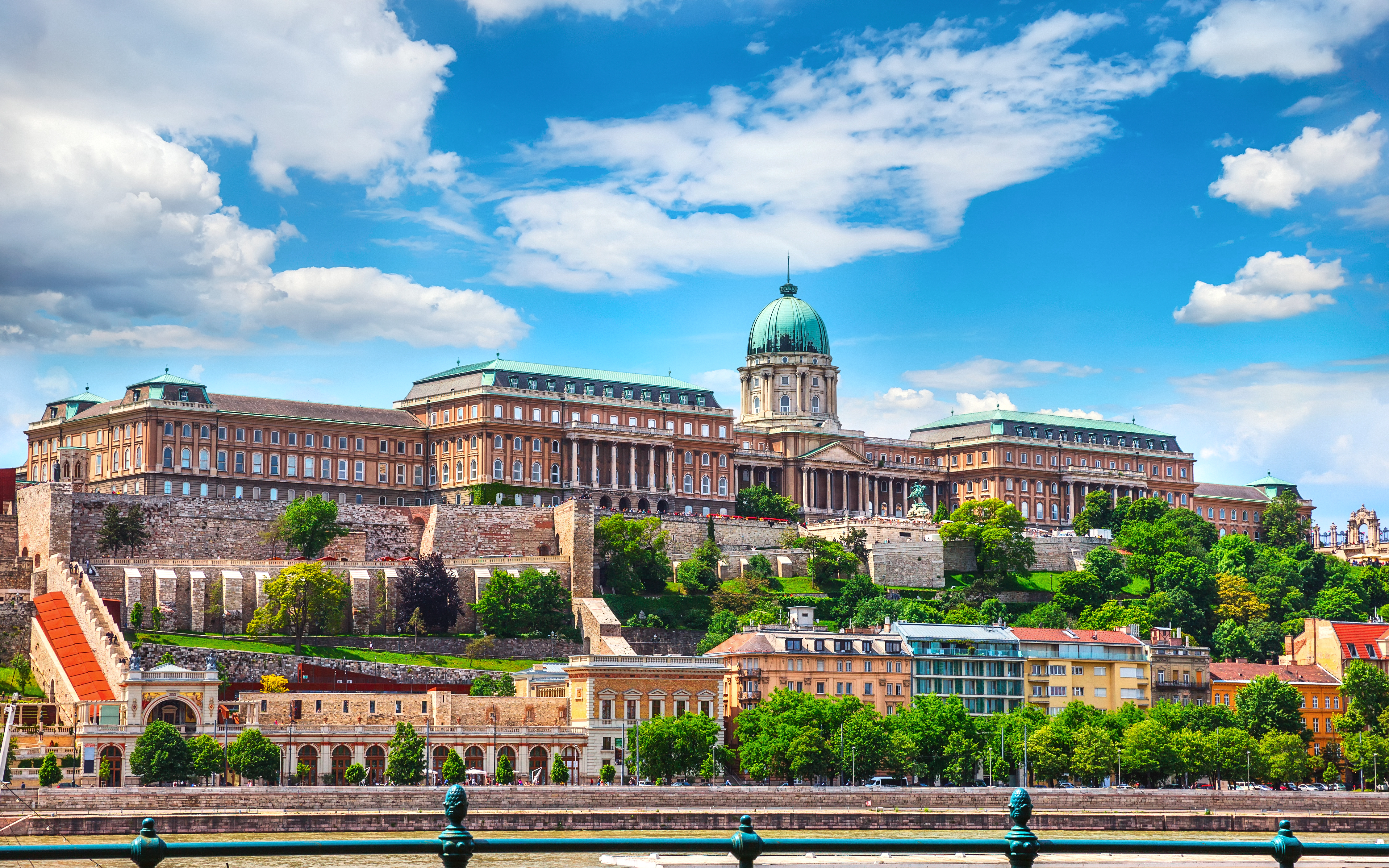 Buda Castle Royal Palace on a hill in Budapest, Hungary, with clear blue sky.