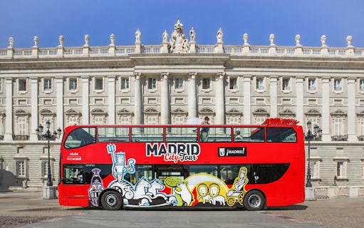 Hop-On Hop-Off bus in front of Madrid's Royal Palace.