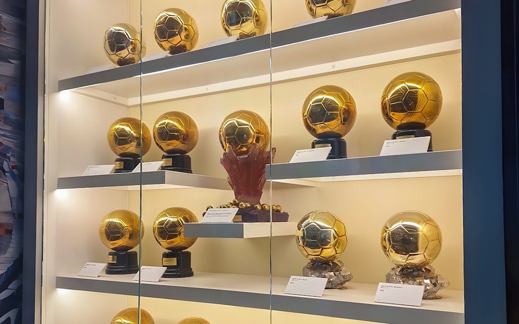Trophies displayed at Santiago Bernabeu Stadium exhibit.