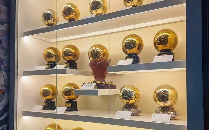 Trophies displayed at Santiago Bernabeu Stadium exhibit.