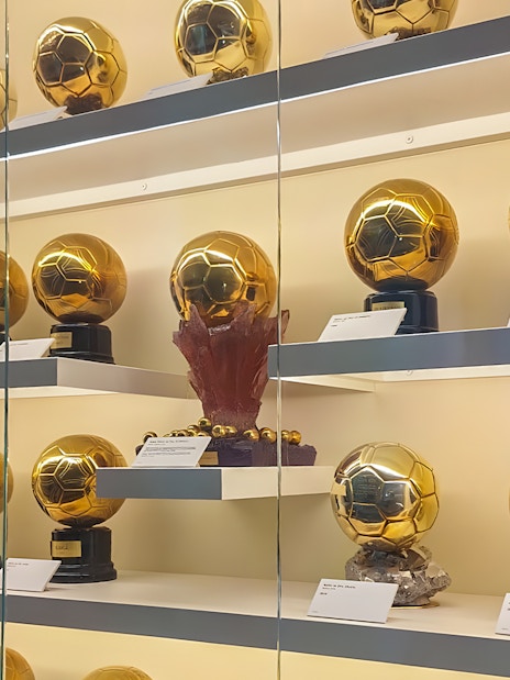 Trophies displayed at Santiago Bernabeu Stadium exhibit.