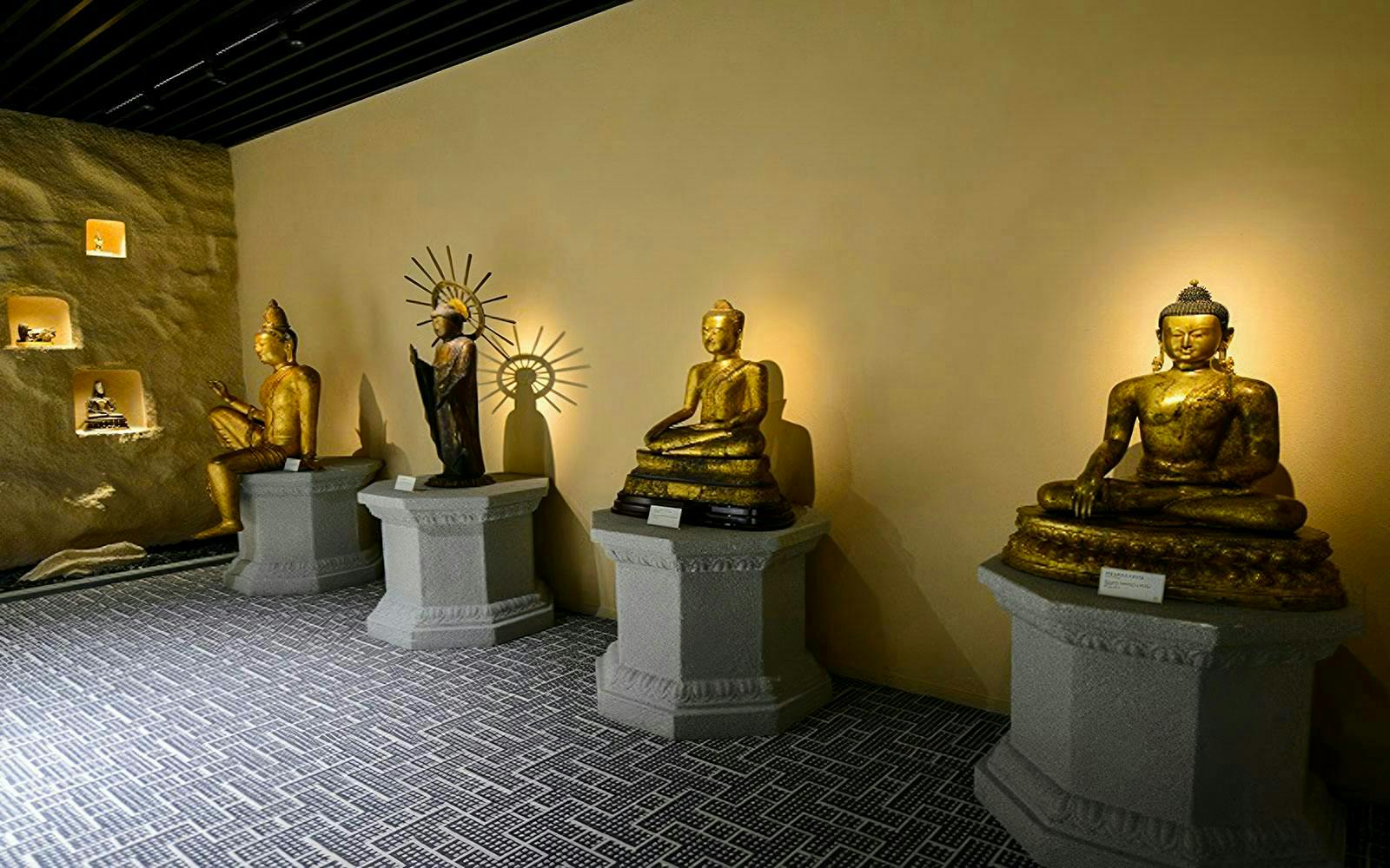 Buddha statues displayed at Shanghai Guanfu Museum.