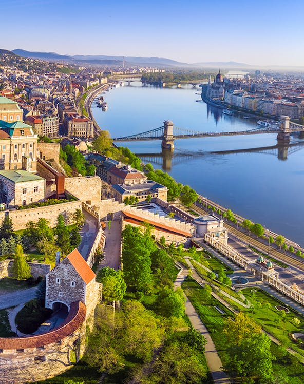 Aerial view of Budapest featuring the Danube River and Chain Bridge.
