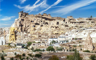 Cavusin village rock formations and ancient dwellings in Cappadocia, Turkey.