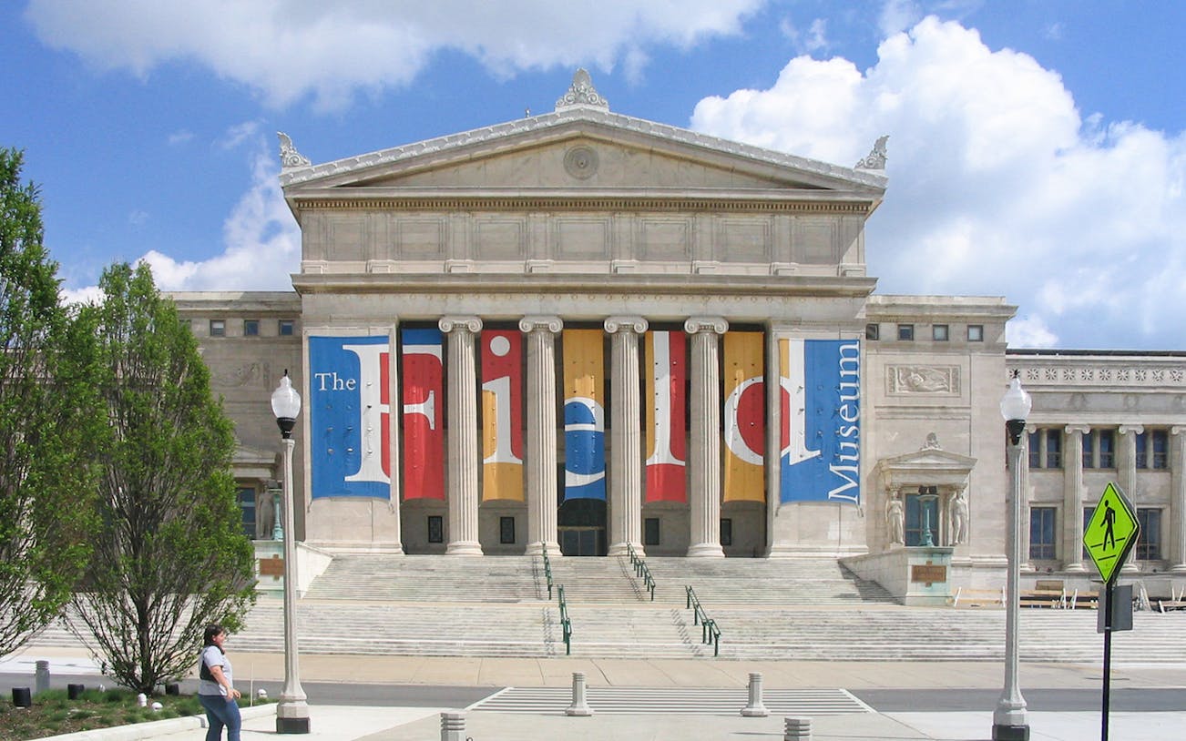 Field Museum of Natural History entrance with columns and banners in Chicago.
