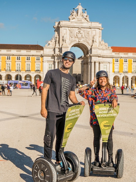 Tourists on Segways in front of Praça do Comércio, Lisbon.
