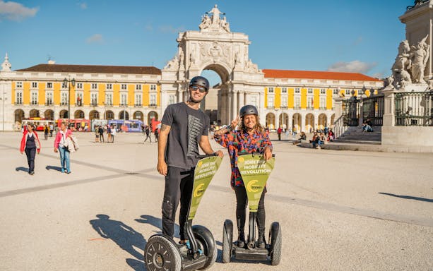 Tourists on Segways in front of Praça do Comércio, Lisbon.