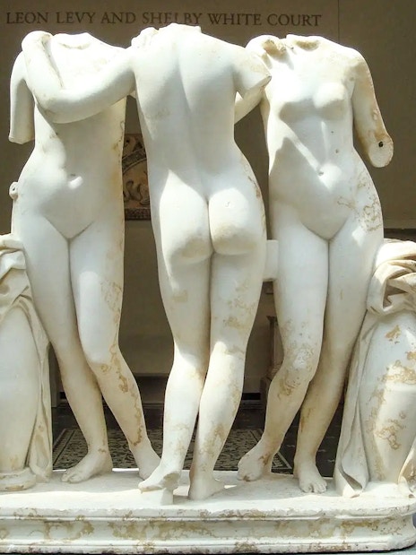 Three marble statues in The Met Museum's Leon Levy and Shelby White Court.