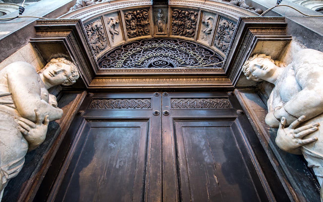 Ornate entrance with sculptures at Doge's Palace, Venice, part of 3 Museum Pass tour.
