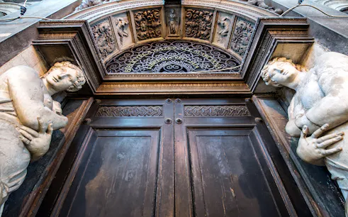 Ornate entrance with sculptures at Doge's Palace, Venice, part of 3 Museum Pass tour.