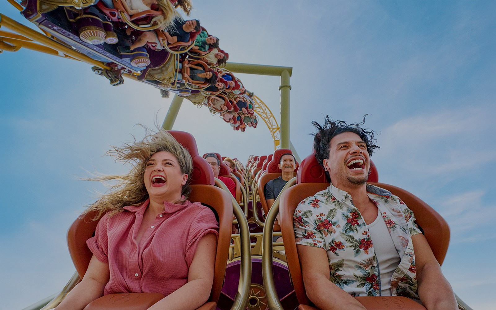 Thrill-seekers enjoying a rollercoaster ride