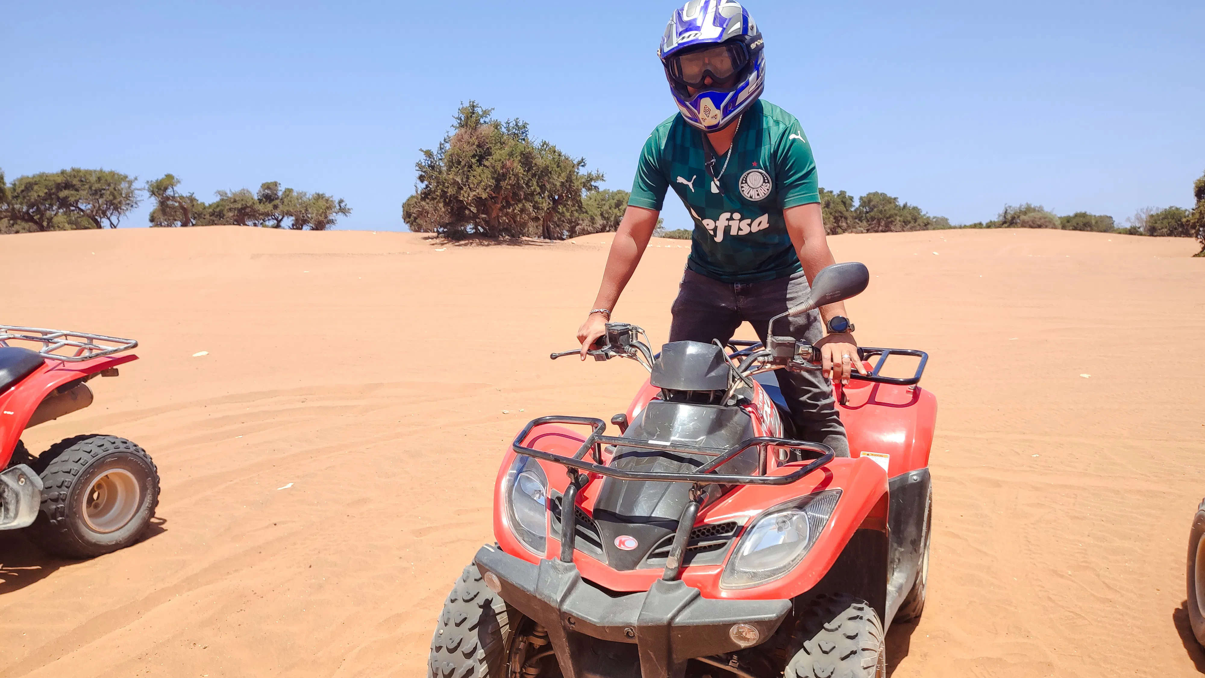 Quad biking on desert terrain during Agadir adventure tour.