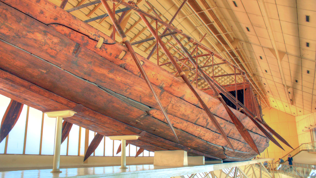 Khufu's Solar Ship displayed at the Grand Egyptian Museum, Giza, Egypt.