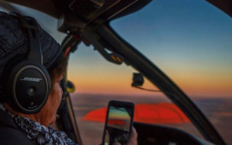 Helicopter view of Uluru at sunset during 25-minute Uluru & Kata Tjuta tour.
