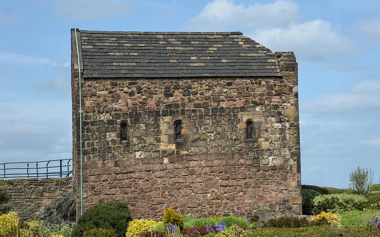 St Margaret’s Chapel in Edinburgh with stone walls and small arched windows.