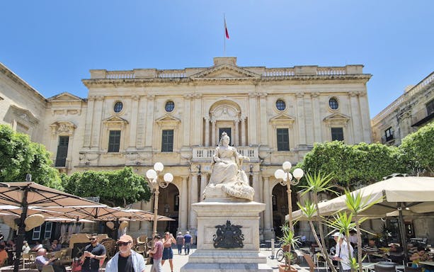 Statue of Queen Victoria in front of the National Library, Valletta Food Tour.