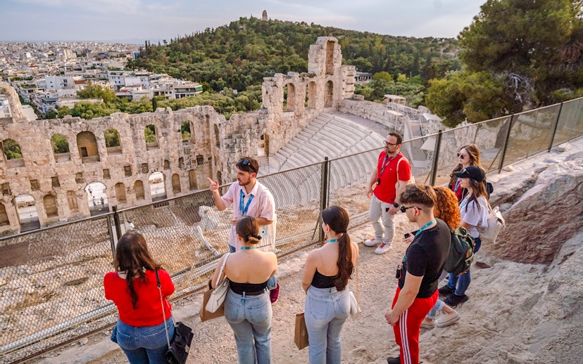 Guided group tour at Odeon of Herodes Atticus amphitheater in Athens, Greece.