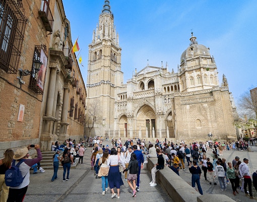 Visitors with a guide at Toledo Cathedral, Spain