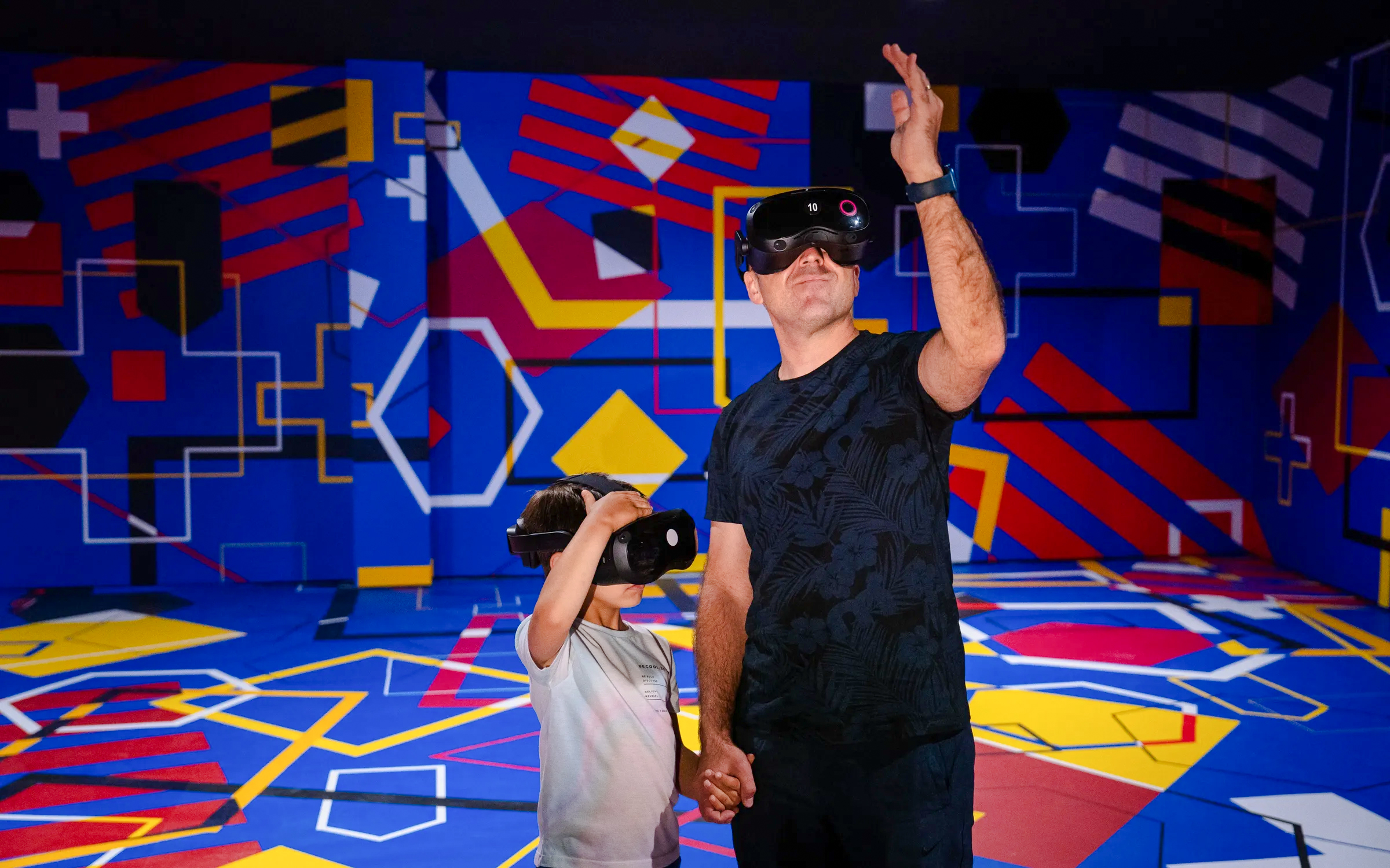 Visitors using VR headsets at Spotify Camp Nou Barça Museum exhibit.
