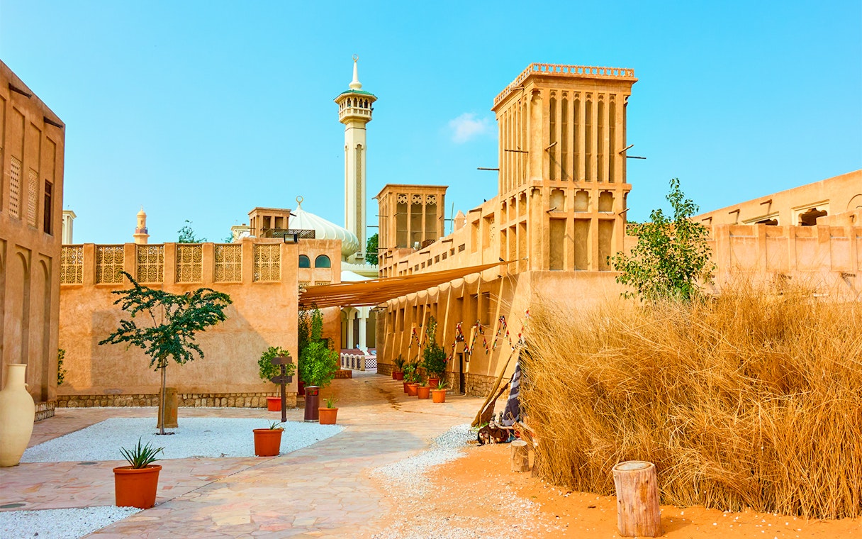 Historic Al Fahidi District in Dubai showcasing traditional wind towers and architecture.
