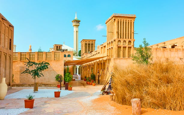 Historic Al Fahidi District in Dubai showcasing traditional wind towers and architecture.
