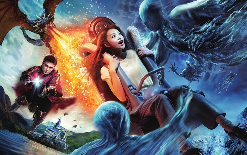 Visitor on Harry Potter and The Forbidden Journey ride at USJ with magical creatures.