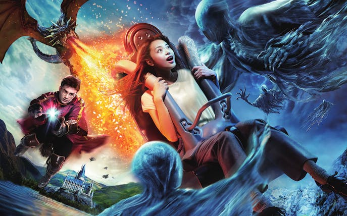 Visitor on Harry Potter and The Forbidden Journey ride at USJ with magical creatures.