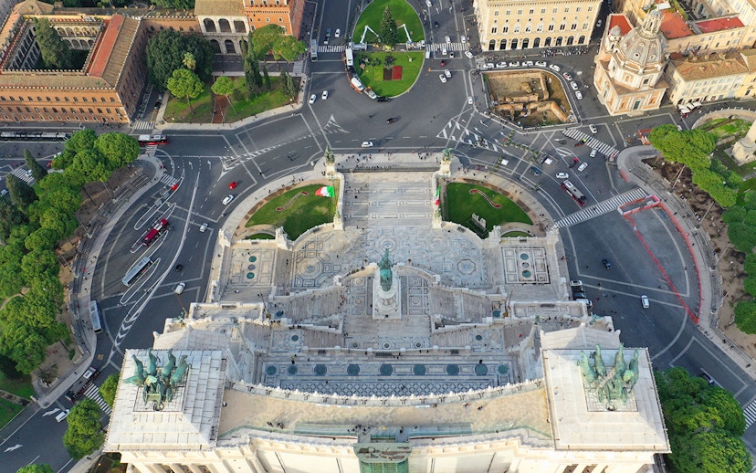Aerial view of Altare della Patria in Rome, showcasing the monument and surrounding streets.