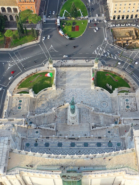 Aerial view of Altare della Patria in Rome, showcasing the monument and surrounding streets.