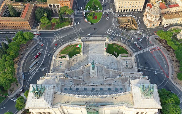 Aerial view of Altare della Patria in Rome, showcasing the monument and surrounding streets.
