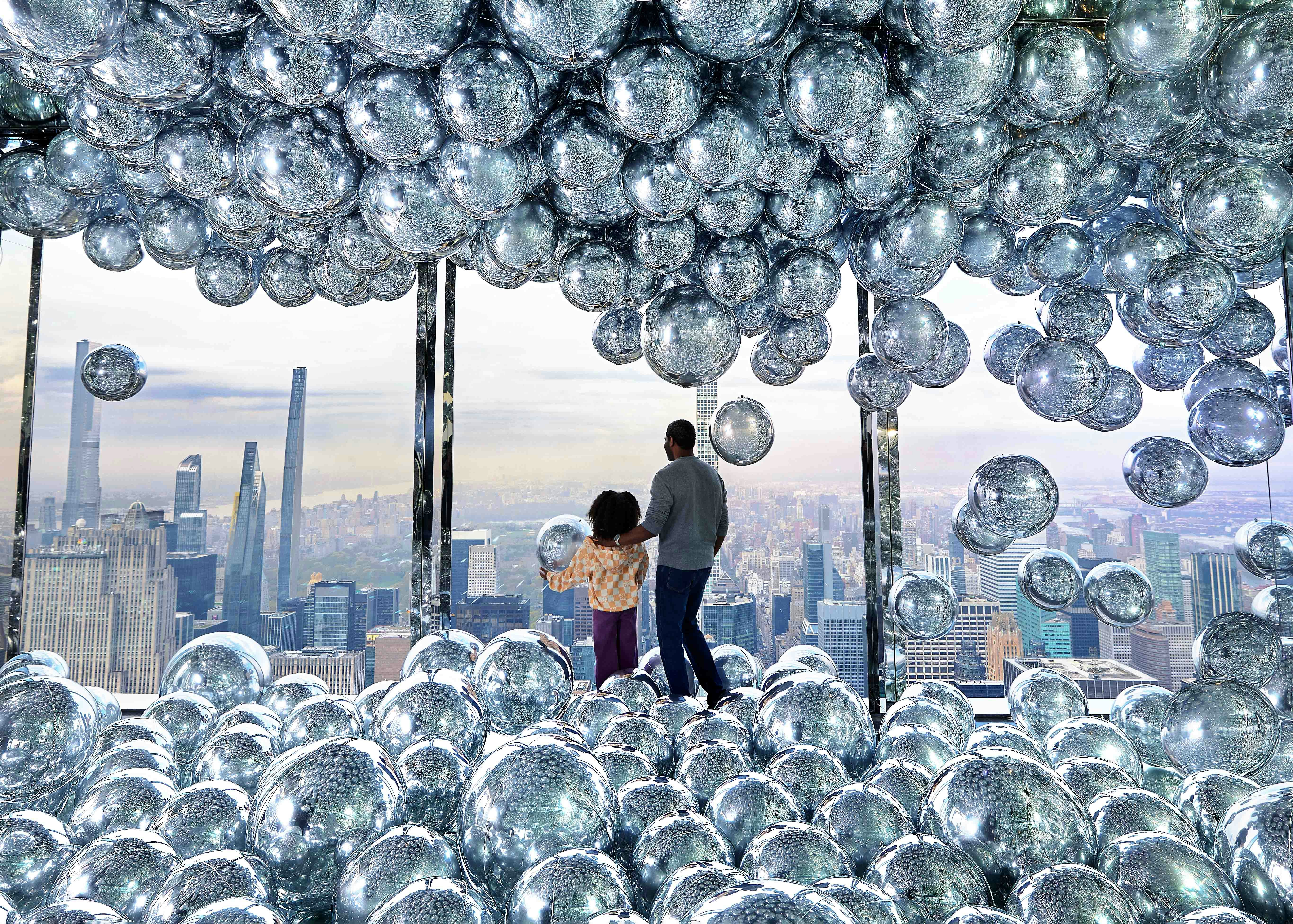 SUMMIT One Vanderbilt observation deck with panoramic views of New York City skyline.