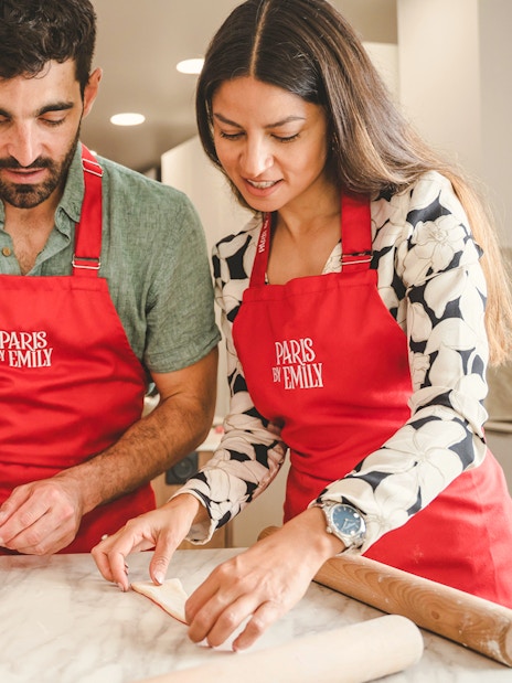 People making croissants at Emily in Paris Croissant-Making Workshop.