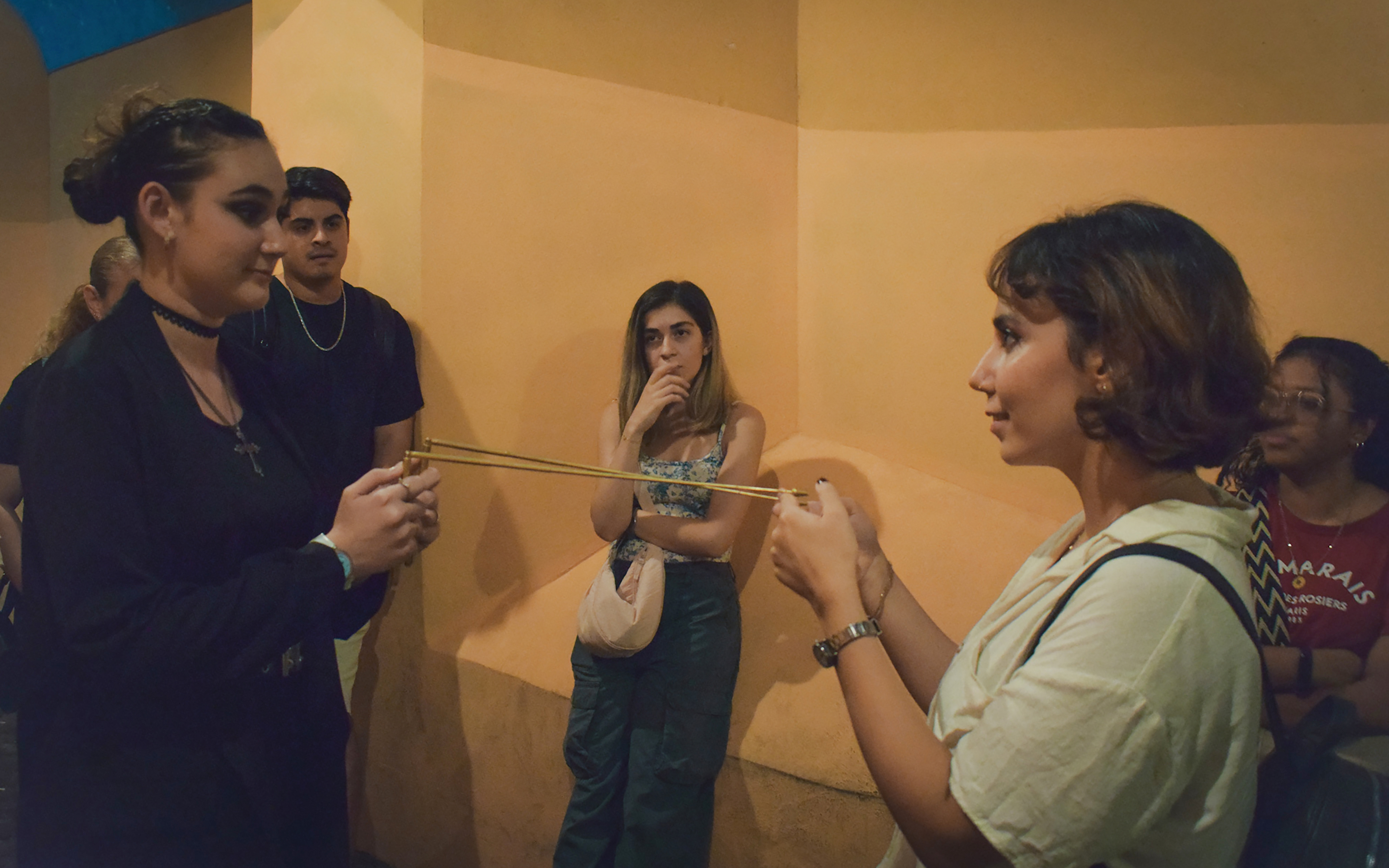 Participants engaging in a Ghost Walking Tour of Rome, discussing paranormal activity.