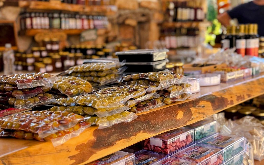 Local products displayed during VIP Above & Beyond Shipwreck & Blue Caves Tour in Zakynthos.