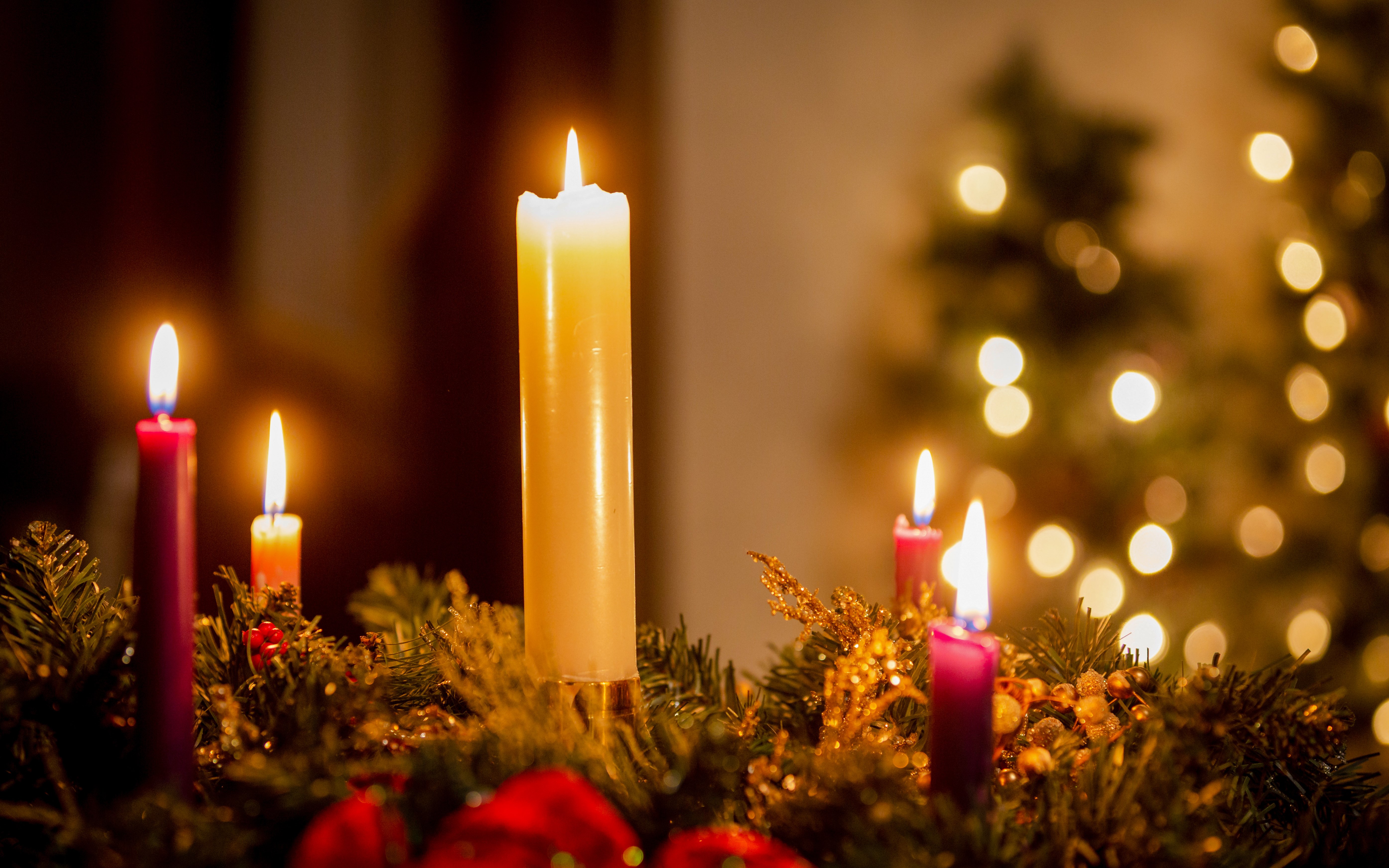 Candles lit for Christmas service at Canterbury Cathedral.