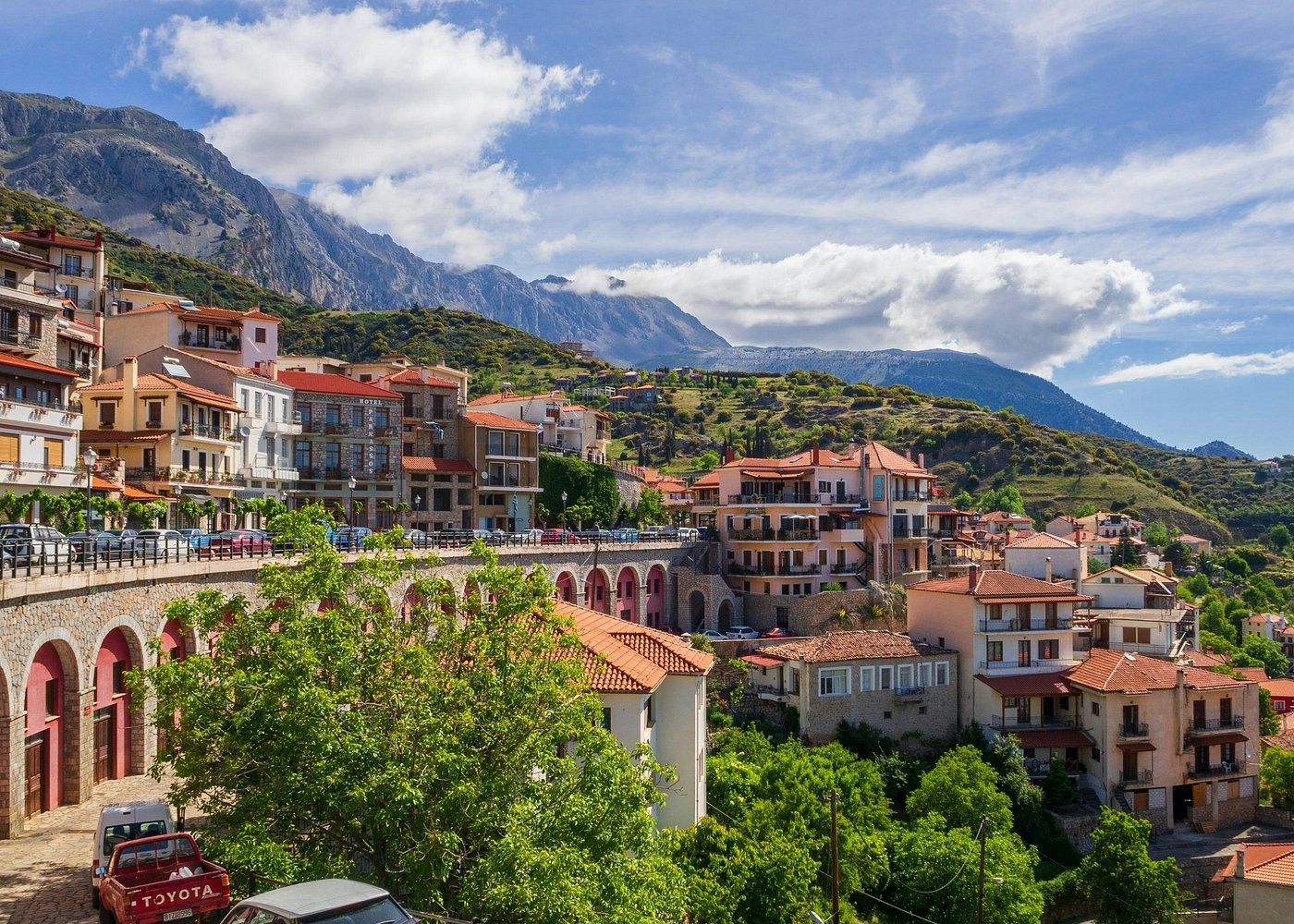 Arachova Greece landscape with traditional houses and mountainous backdrop.