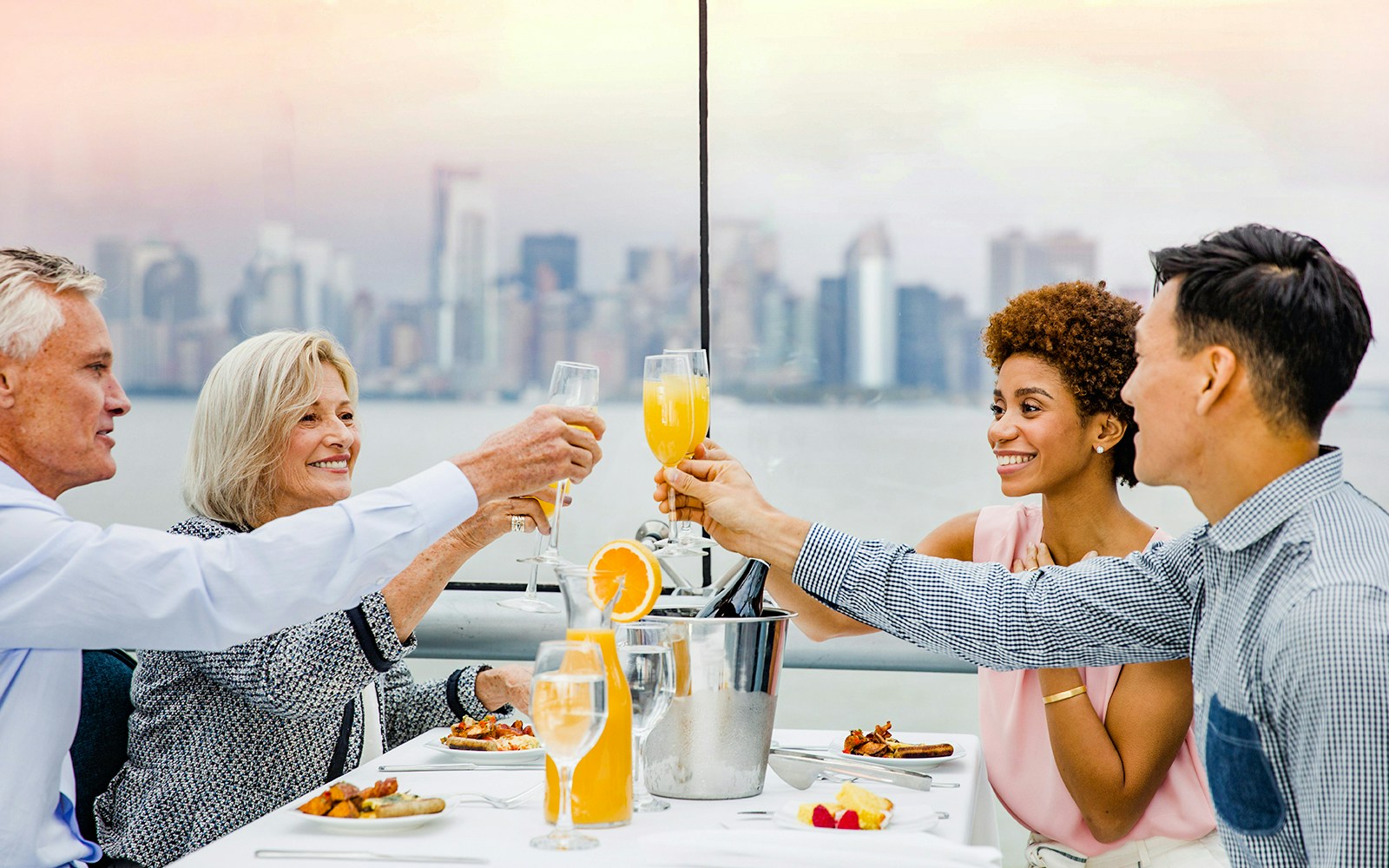 Breathtaking view of the New York skyline from the Bateaux New York Premier Dinner Cruise at sunset