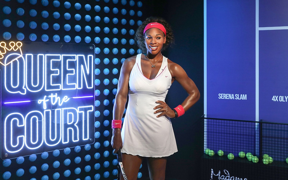 Serena Williams wax figure at Madame Tussauds Dubai with tennis theme.
