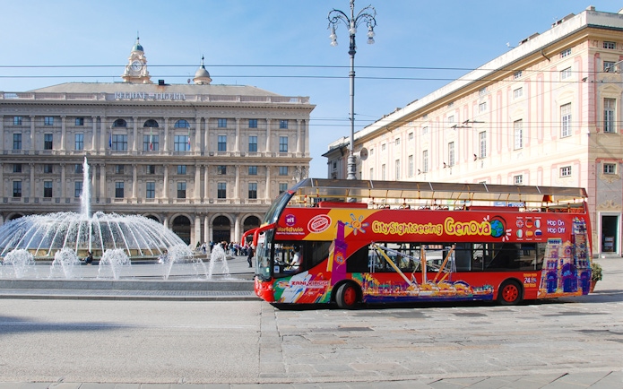 City Sightseeing Hop-On Hop-Off bus in front of Piazza De Ferrari, Genoa.