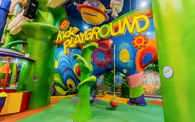 Colorful indoor playground at Berjaya Times Square Theme Park, featuring vibrant structures and play areas.