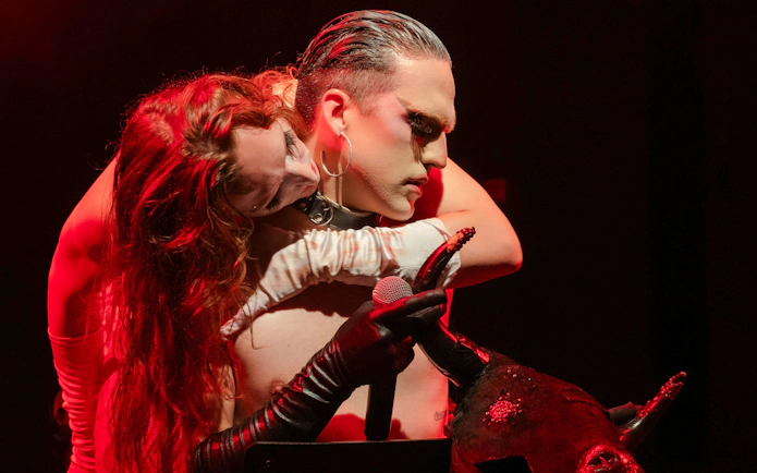 Performers on stage at Madame Arthur cabaret show, Paris.