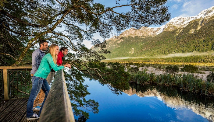 Mirror Lakes view on the way from Te Anau to Milford Sound during a scenic cruise tour.