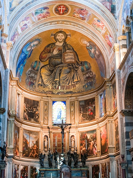 Interior of Pisa Cathedral with ornate frescoes and arches, part of the Small-Group Guided Tour.