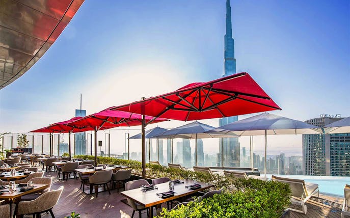 CÉ LA VI Dubai terrace dining with Burj Khalifa view.