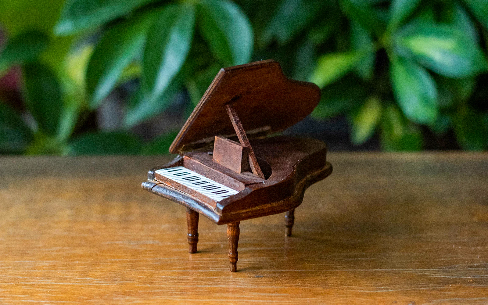 Miniature grand piano from Queen Mary Doll House collection.