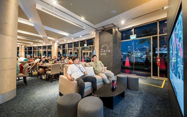 Guests enjoying the Vista Suite during the Formula 1 Singapore Grand Prix 2025 hospitality package.