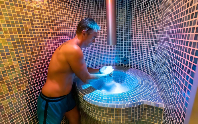 Man enjoying a spa experience at Aquashow Indoor Park.