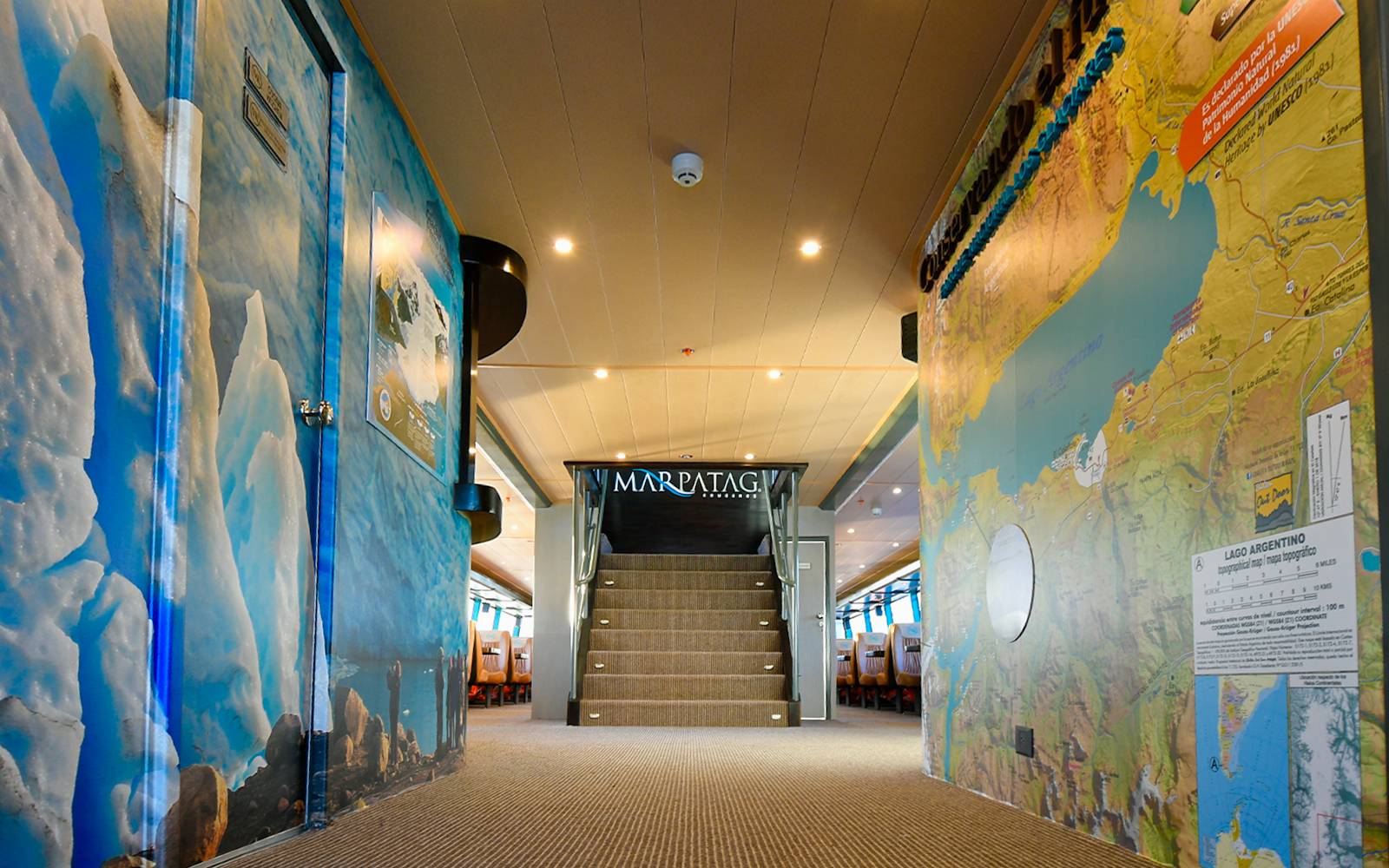 Interior of tour boat with glacier and map murals, Perito Moreno, Spegazzini & Upsala tour.