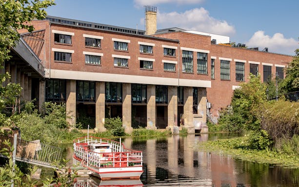 Stelzenhaus view from water during Lindenauer Harbor sightseeing cruise.