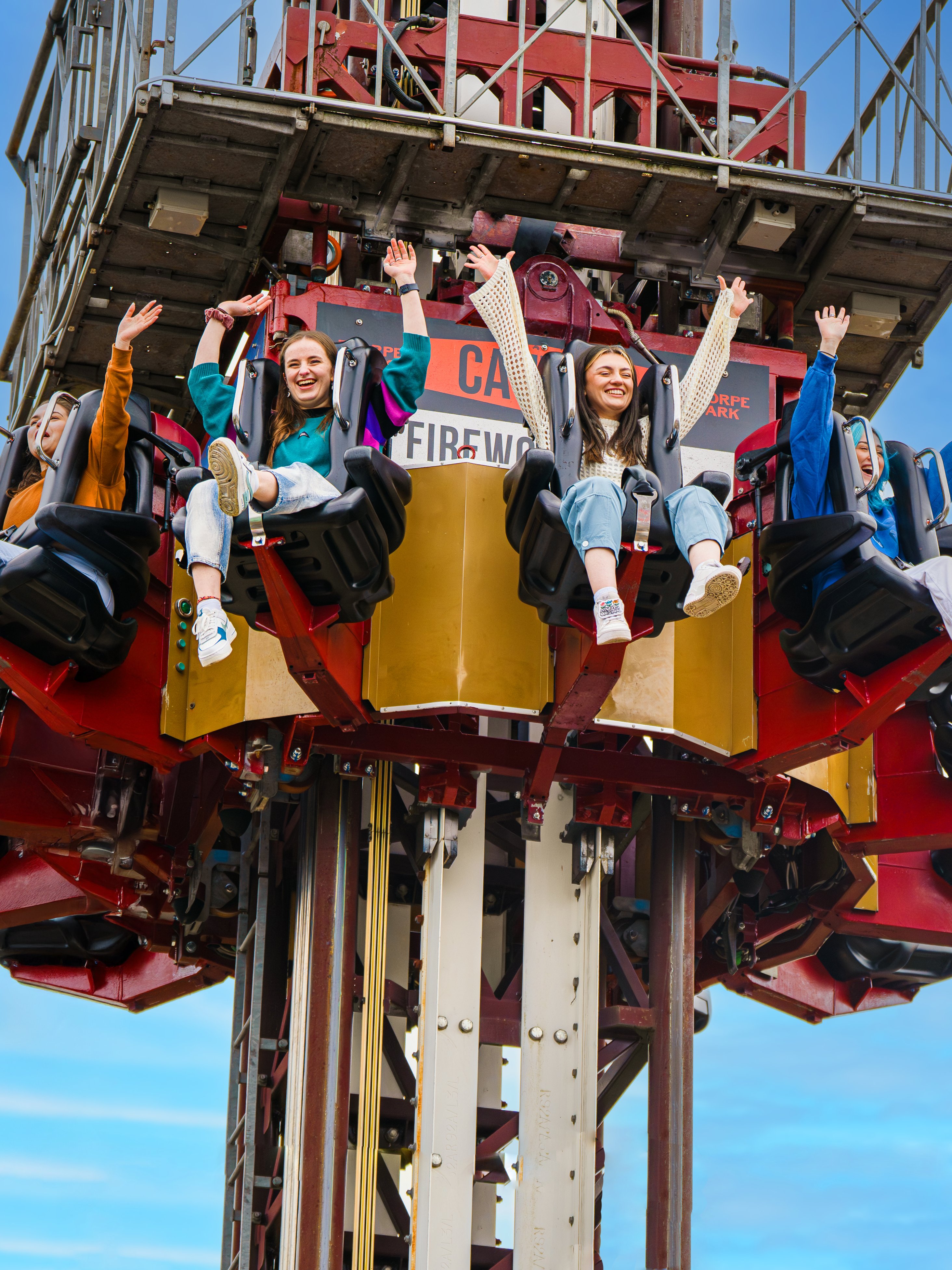 Visitors enjoying a drop tower ride at Thorpe Park.